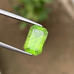 Yellowish Green Natural Peridot 3.35 Carat Emerald Cut Loose Gemstone for Ring
