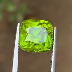 Vivid Lime Green Natural Peridot 9.03 Carat Cushion Cut Loose Gemstone for Ring