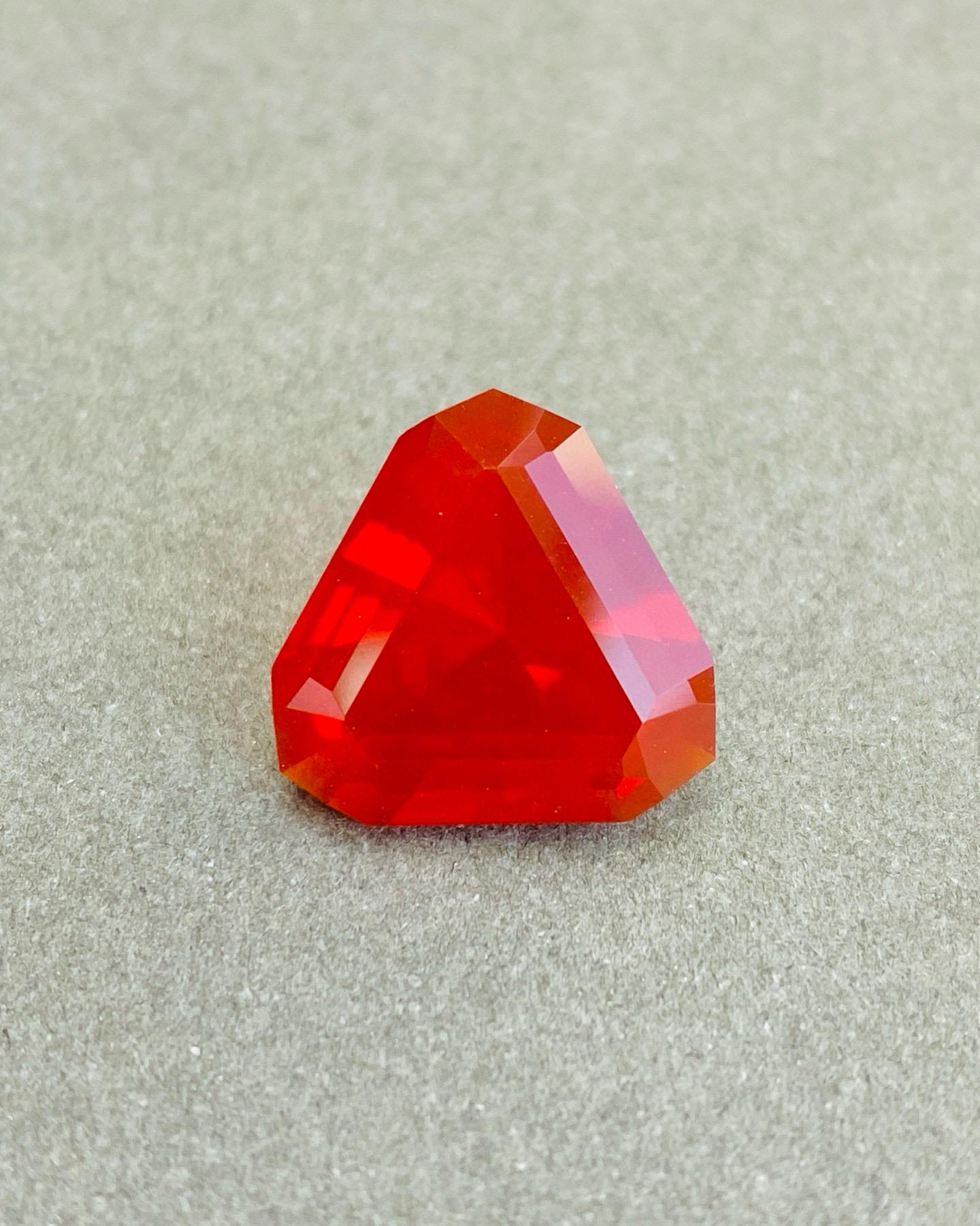 OPA47
Natural True Red Mexican Opal precision cut Triangle shape Gemstone 

Name Stone : Red Mexican Opal 
weight :  5.41 Carats
size : 13.7x7.6 mm
origin : Mexico
color : Red
clarity : 99% eye clean 
Cutting : Precision Cut




