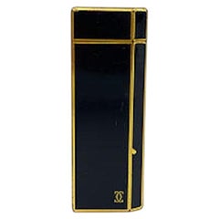 Accendino Cartier Vintage nero e dorato