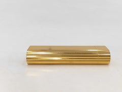 Briquet Cartier vintage en métal strié, couleur or