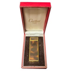 Briquet Cartier Paris vintage, couleur or, style écaille de tortue marron, avec son coffret
