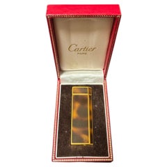 Briquet Cartier Paris vintage, couleur or, style écaille de tortue marron, avec son coffret