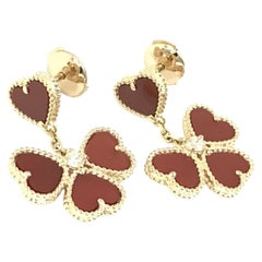 Pendientes colgantes «Sweet Hearts» de Van Cleef & Arpels, con cornalina roja y oro rosa de 18 quilates