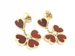 Pendientes colgantes «Sweet Hearts» de Van Cleef & Arpels, con cornalina roja y oro rosa de 18 quilates
