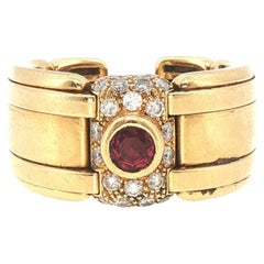 Bague vintage de style Rolex en or 18 carats, sertie de diamants et de rubis, à maillons