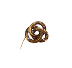 Victorian 14k Gold Ruby, Sapphire and Diamond Trinity Knot Brooch