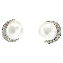 Orecchini vintage Seaman Schepps in oro bianco 14 carati con perle e diamanti