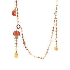 Collar Valente de oro de 18 quilates con perlas, diamantes amarillos y esmalte