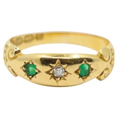 Bague ancienne en or 18K avec diamant et émeraude
