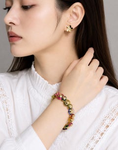 Bracelet vintage Marina B. en verre multicolore et or 18 carats