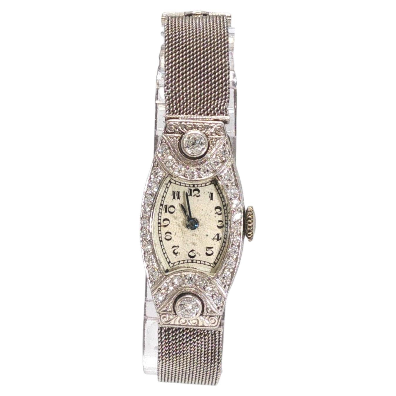 Orologio Art Déco con bracciale a maglia in platino e diamanti