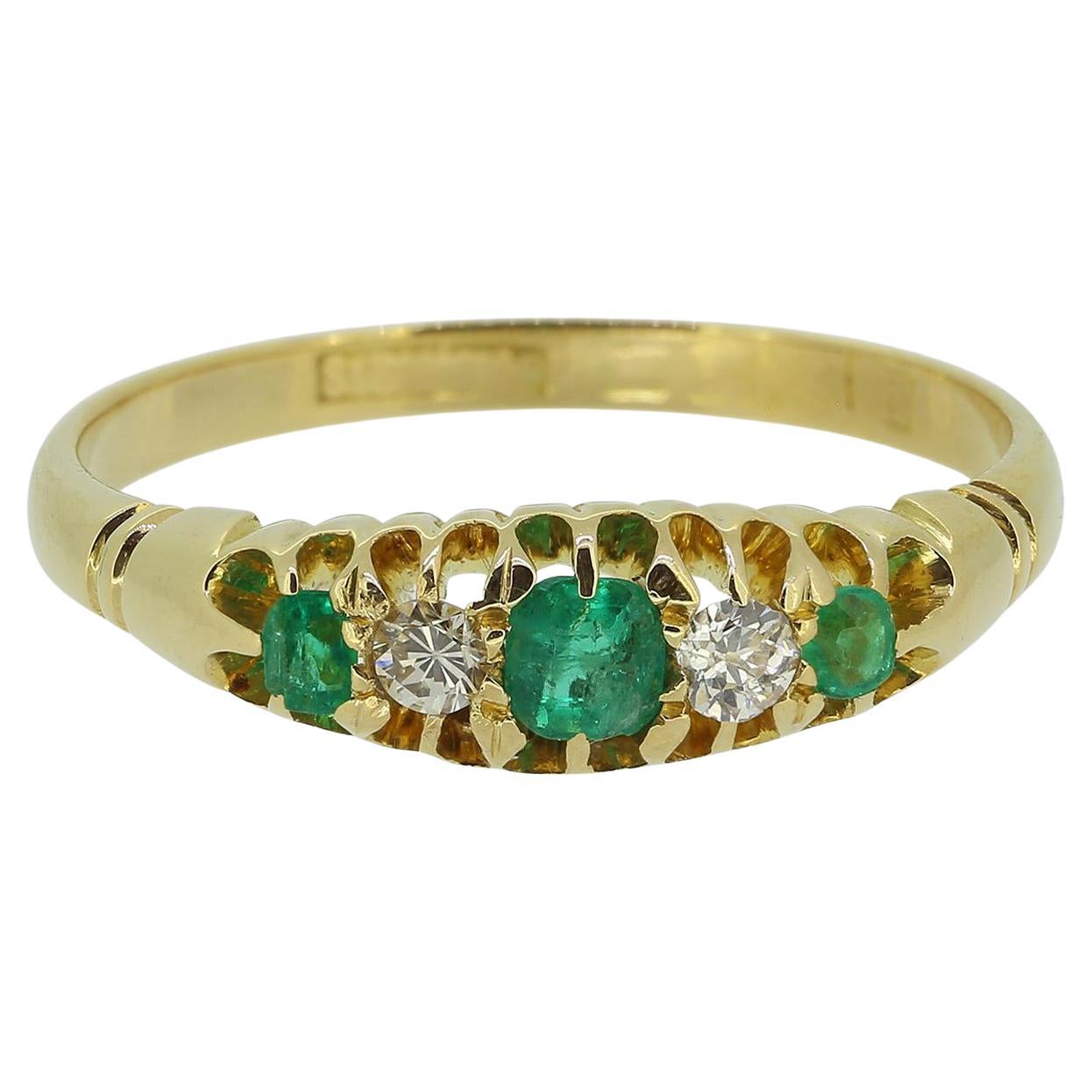 Anello edoardiano con smeraldo e diamante a cinque pietre