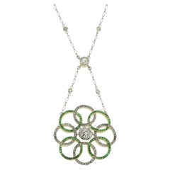 Collier Art déco en émeraudes et diamants