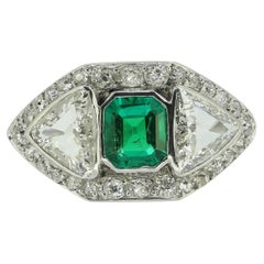 1940s Colombian Emerald and Diamond Three-Stone Ring
