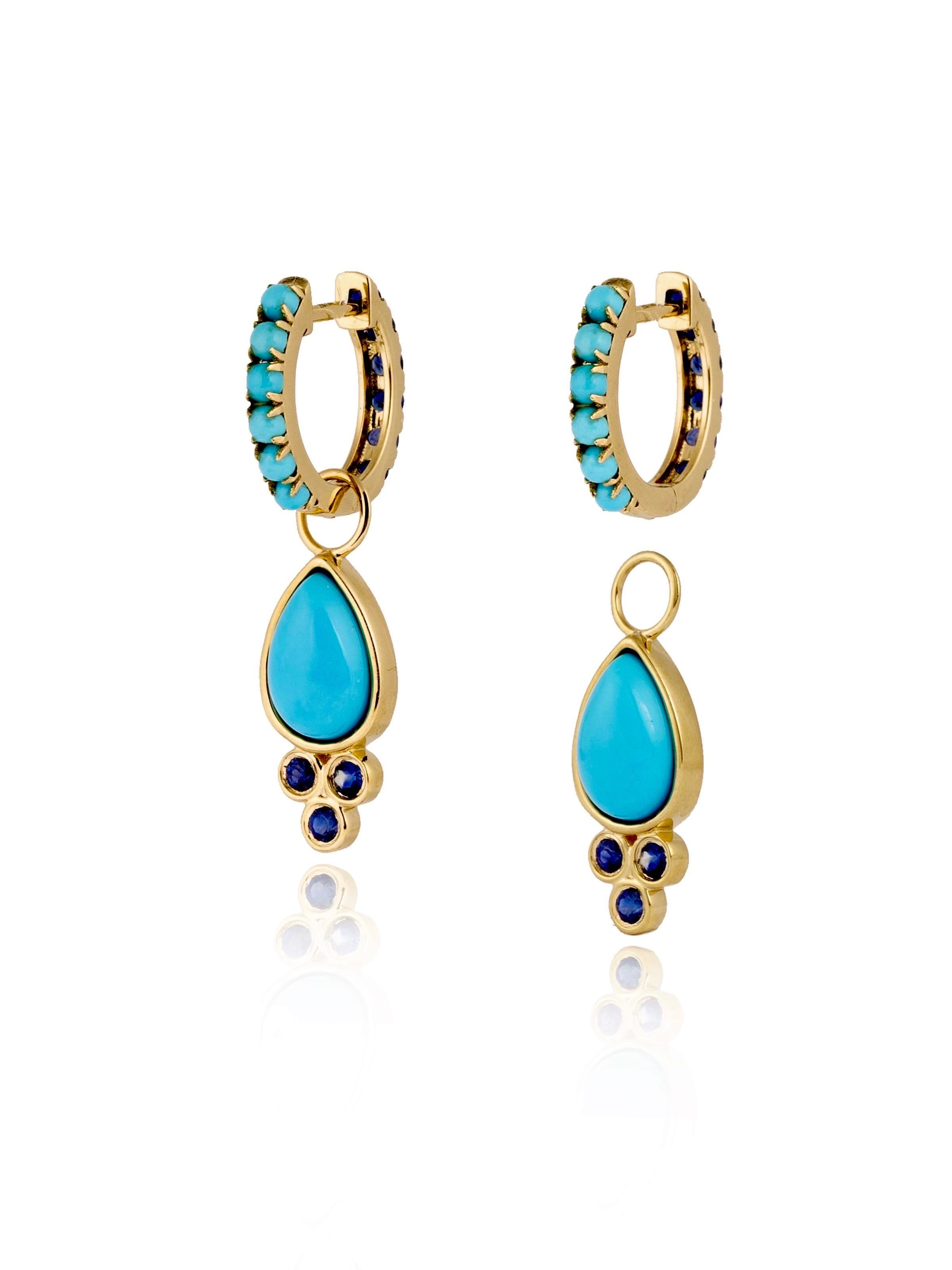 Découvrez les boucles d'oreilles double face en saphir et turquoise de Nina Zhou avec rehausseurs en forme de gouttes. Ces boucles d'oreilles exquises redéfinissent l'élégance, avec une combinaison étonnante de saphirs et de turquoises des deux
