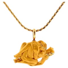 Collana Carrera y Carrera con ciondolo erotico a forma di coppia intrecciata in oro 18 carati