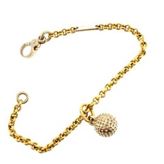 Bracelet Pomellato en or 18 carats avec pendentif en forme de boule