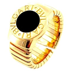 Bague Tubogas Bvlgari en or jaune 18 carats et onyx, taille ajustable 7,5, Italie