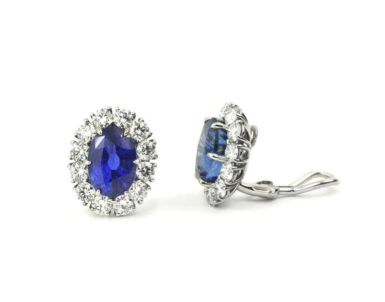 Platinum, Oval Natural Burma Sapphire and Diamond Earrings

These fine oval Sapphires are 4.80 and 5.38 carats and GIA certified Natural, untreated Burma Sapphires. These are a rare and stunning set of deep blue Sapphires.  Set with 24 brilliant