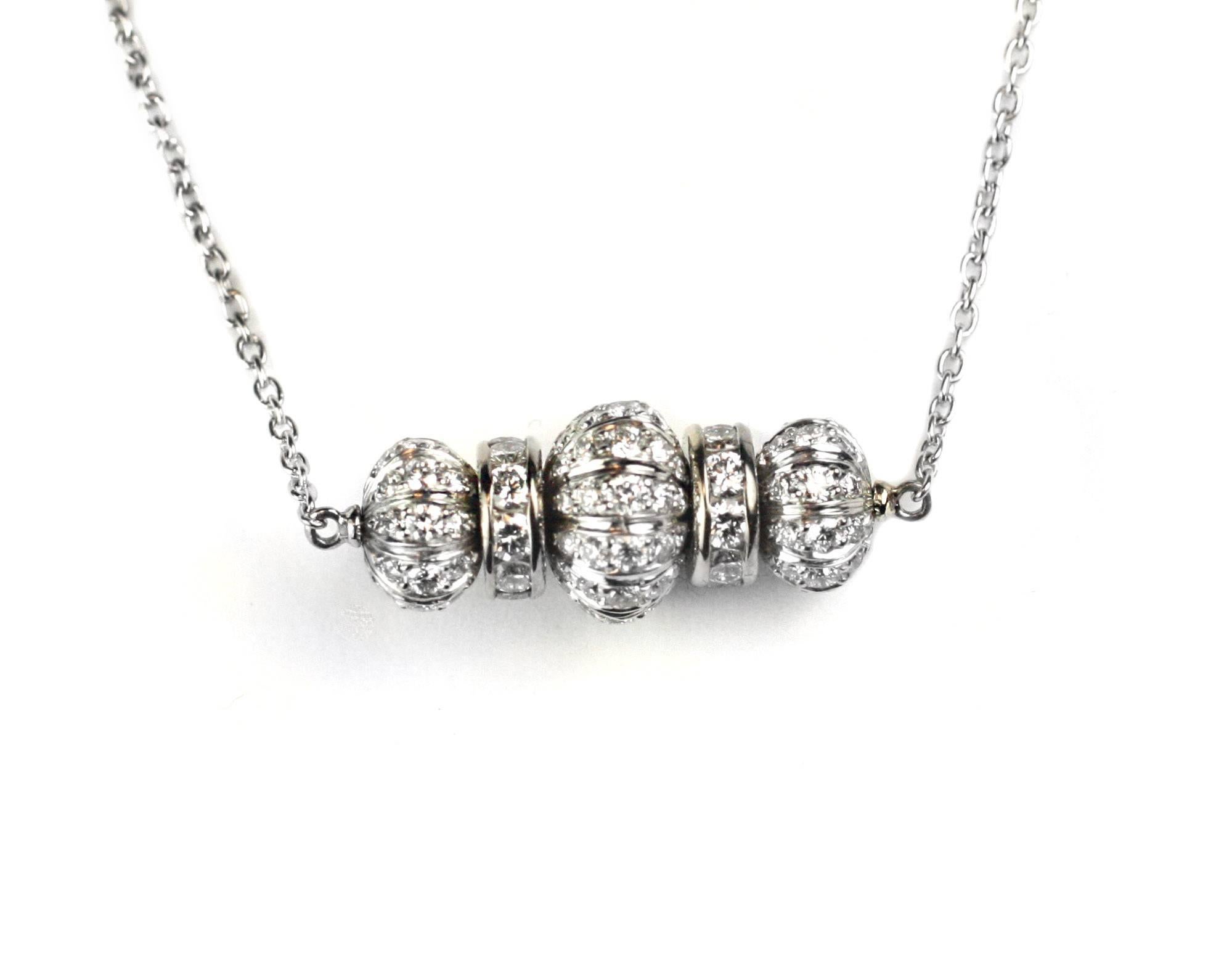 This beautiful necklace is made with platinum diamond beads & 18kt white gold diamond rondelles. Attached to a platinum link 1.5mm chain measuring 18 1/2 inches long.

Designed and made in house by Julius Cohen New York.