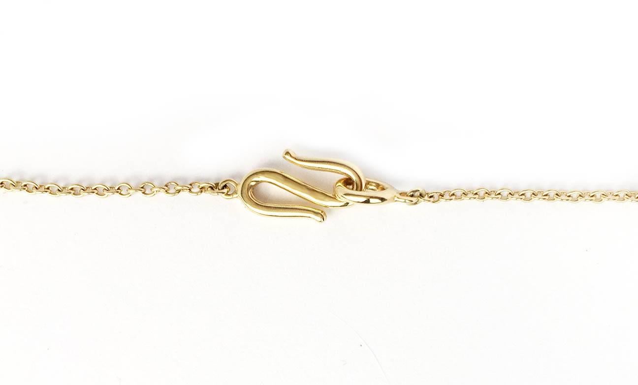 It's all in the details with this great everyday piece.  A classic Julius Cohen motif, this Melon Bead Charm is made of 22 KT Gold. The 18 KT Gold Necklace is 17 inches long and features an 18 KT Gold Hook clasp, also a classic Julius Cohen design. 