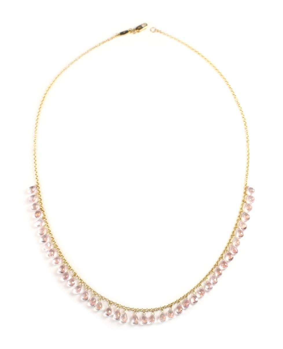 This 18kt Gold chain necklace features 42 beautiful, brioletted Pink Sapphires (21.54 Cts.).  

Designed and made in house by Julius Cohen New York.