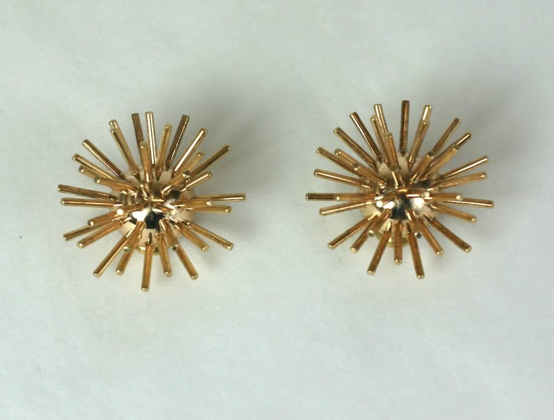 Classically cool Cartier Sputnik earrings in 14k gold. Timeless, forever design with clip back fittings. 
Marked "Cartier 14k, 25344".  Excellent condition. 1960's.  
1.25" across. 