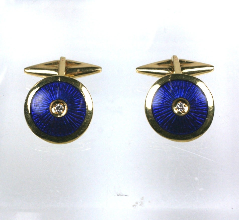 Deep cobalt blue enamel cufflinks with diamond centers. Toggle back fittings, all set in 18k yellow gold.  Excellent condition. 

.5