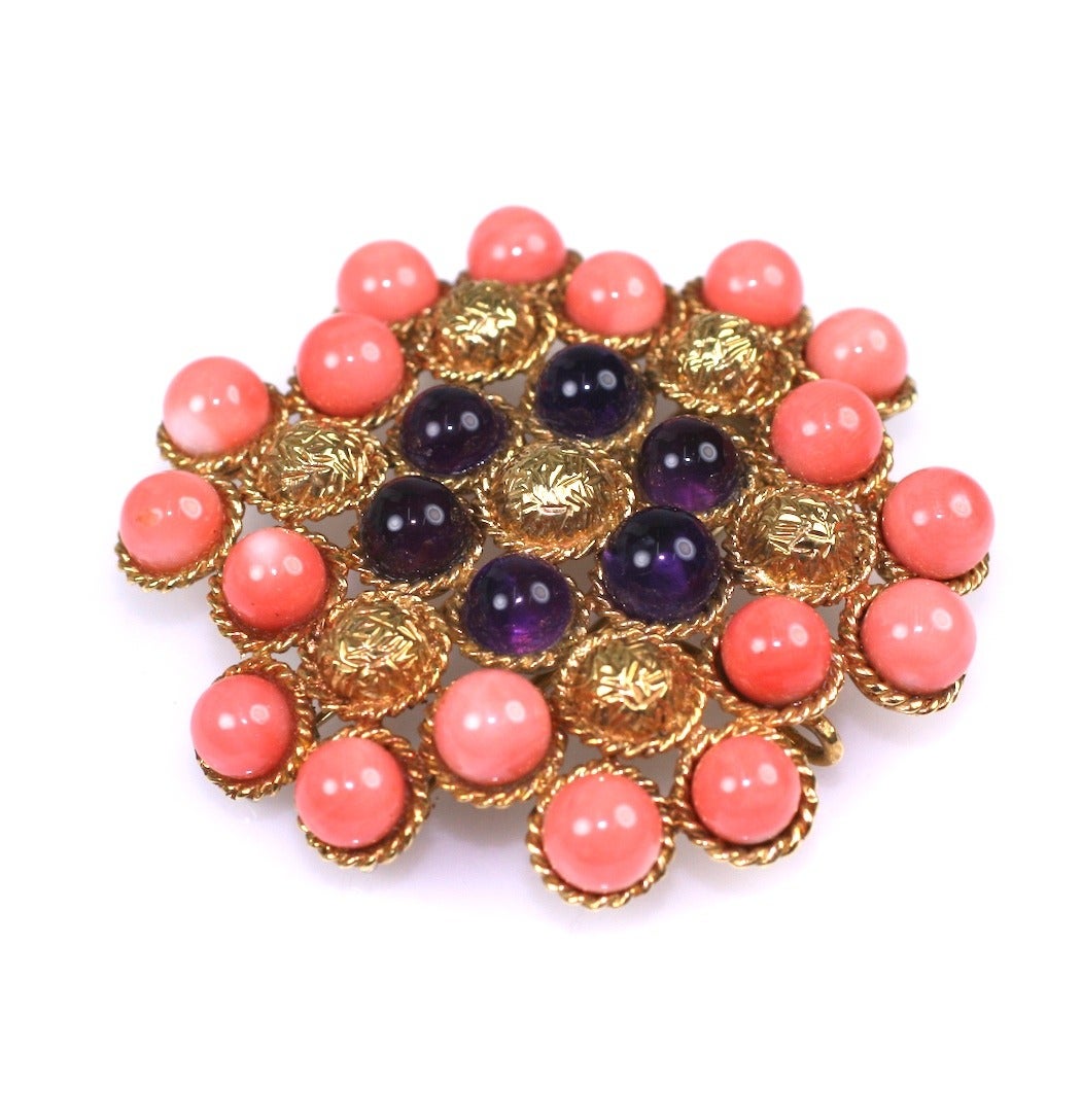Lovely quality textured 18K gold cabochon clip with pink coral and amythest spheres. Similar in design to a Van Cleef style with matching pendant drop.  Textured gold cabochons are edged in twisted wire work. Double clip fitting for stability as