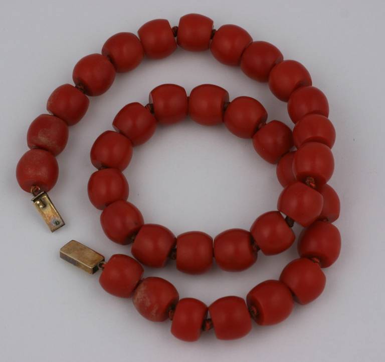 Antique genuine coral barrel shaped beads with 14K gold box clasp. Beads are 16
