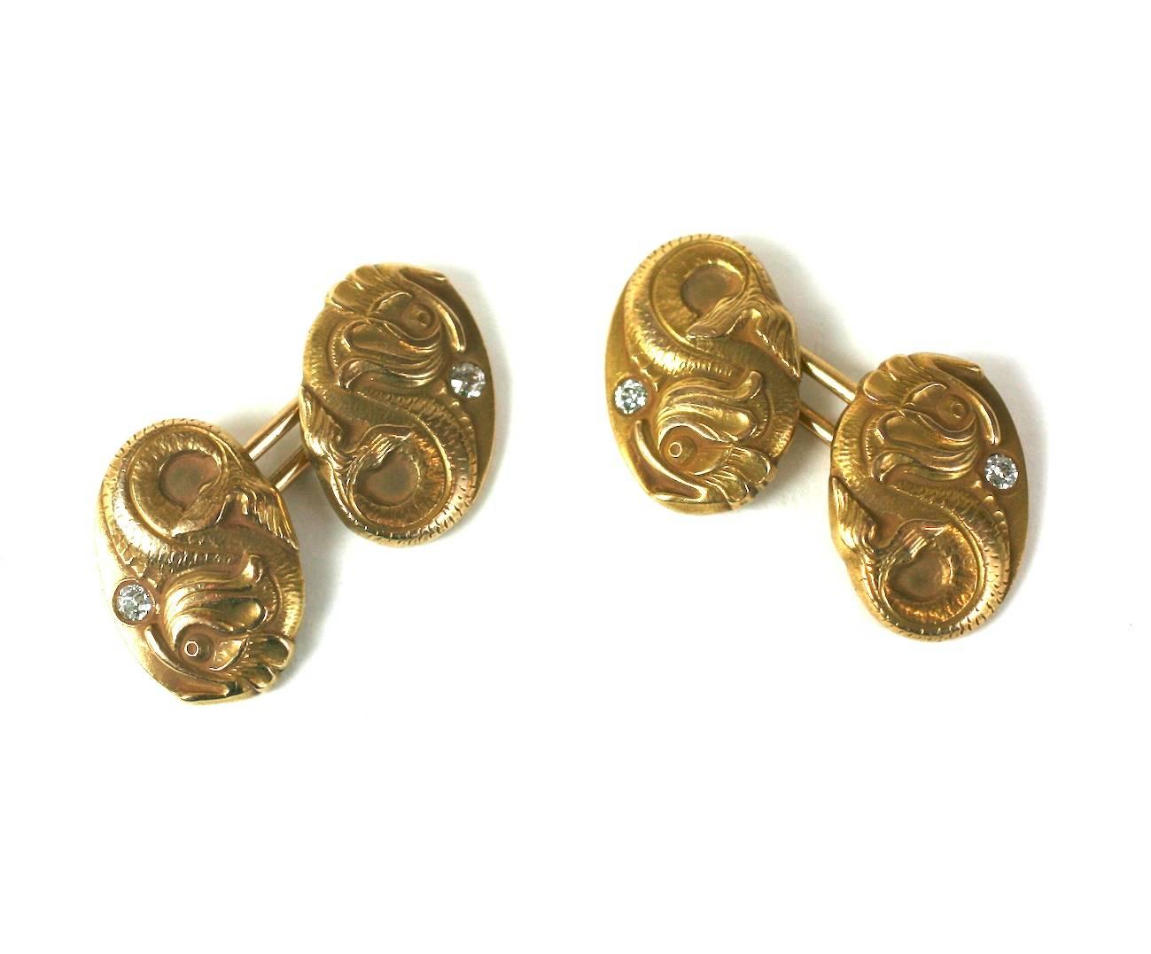 Art Nouveau Diamond Dolphin Cufflinks in 14k gold with diamonds. Exquisite quality and weight. Newark, N.J. 1890's USA. 5/8" x .5".  
Excellent condition.
8.7 dwt.