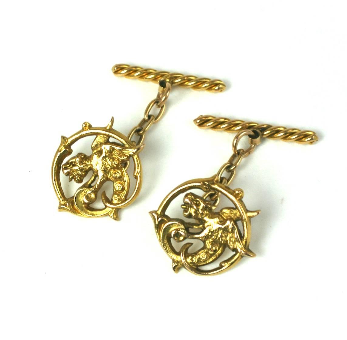 Victorian Griffin 18K Cufflinks with chain and twisted bar toggle. Late 19th Century with wonderful sharp detailing on griffin motifs. Excellent condition. 
Cufflink Face .75