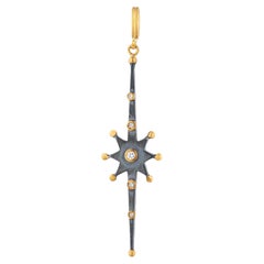 Colgante «Starburst» de Lika Behar en plata oxidada con oro de 24 quilates y diamantes