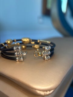 Bracciale Misani in pelle a tre fili con oro giallo 18 carati e argento, con pavé di diamanti