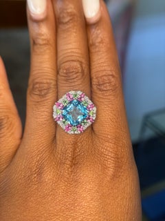 Anillo de Sofragem de oro blanco de 18 quilates con topacio azul, zafiros rosas, tsavoritas y diamantes