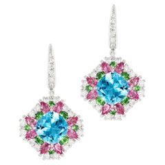 Pendientes de Sofragem de oro blanco de 18 quilates con topacio azul, zafiros rosas y granates tsavorita