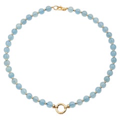 Collier « Story Strand » SYNA en or jaune 18 carats et aigue-marine, édition limitée