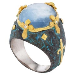 Anillo de Victor Velyan de oro amarillo de 24 quilates y plata con un zafiro azul de 27,95 quilates