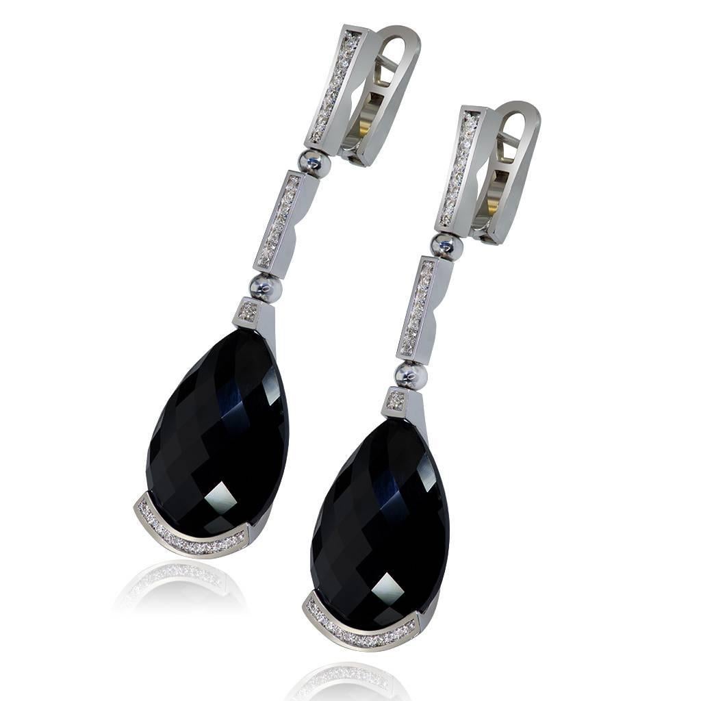 Black Swan Earrings: The gracefulness and poise of the swan has inspired Alex Soldier to create the Swan collection. It is dedicated to every woman who is in love. The form of the center stone resembles a swan's head, and the elongated diamond bar