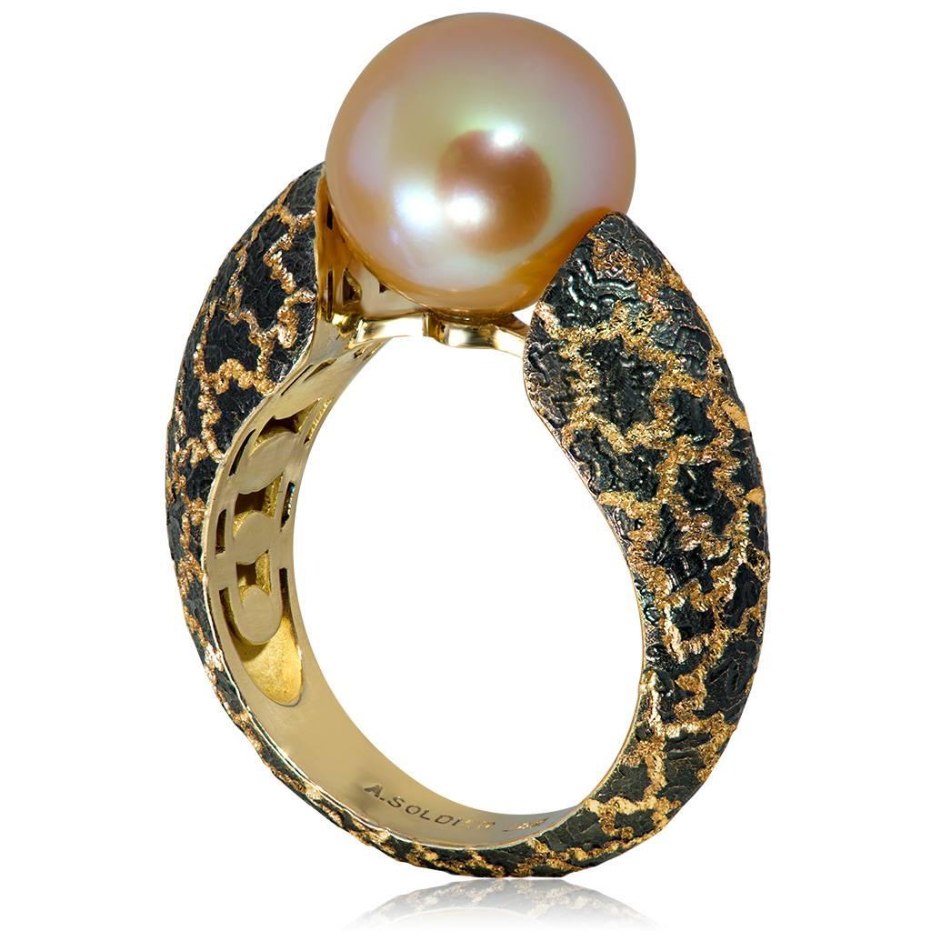 Freshwater Pearl Ring by Alex Soldier: made in 18 karat rose gold with signature metalwork. 10 mm Freshwater pearl. Handmade in NYC. Ring size: 6.5. Complimentary ring sizing is available within 2 business days. 

Key Facts About The Artist: Known