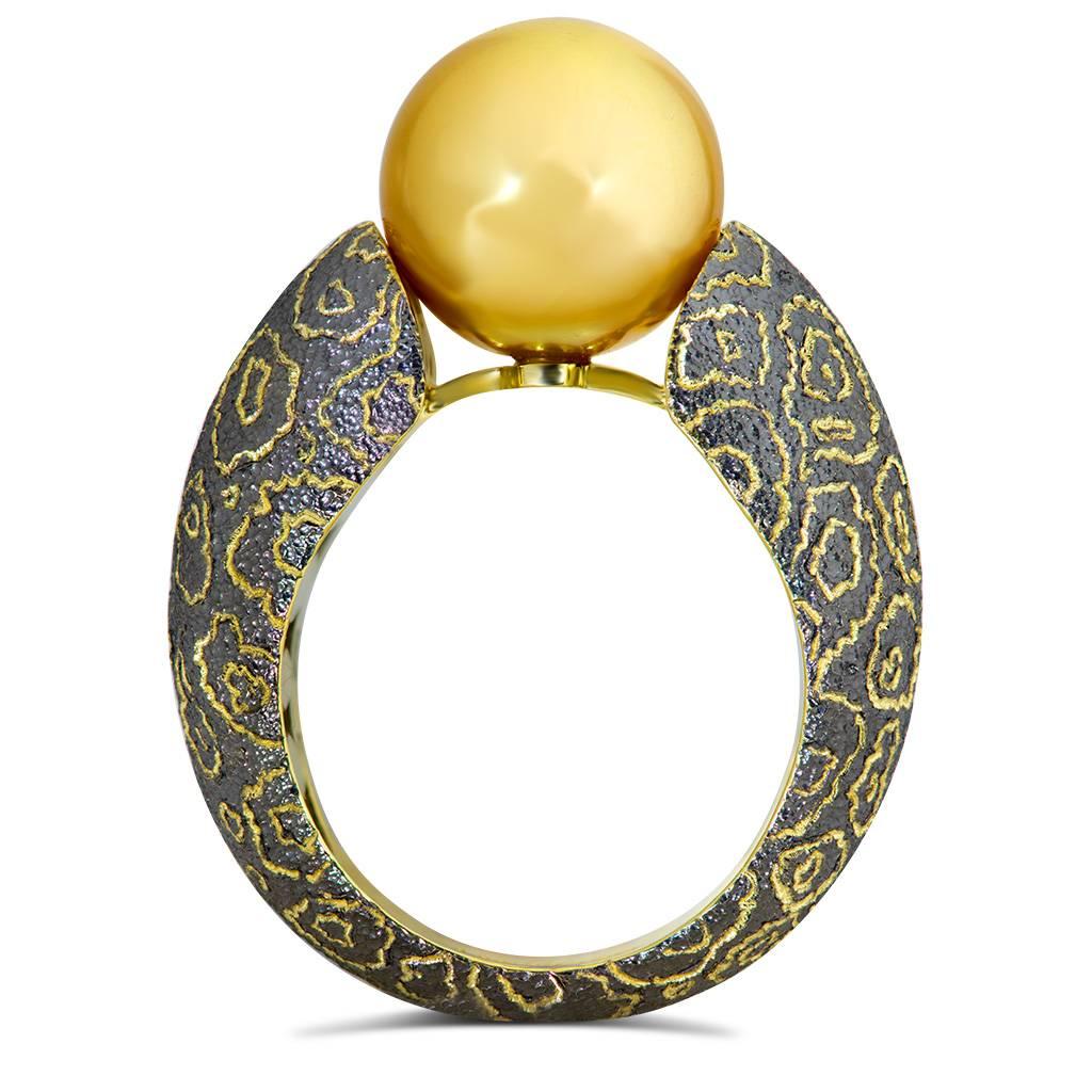 South Sea Pearl Ring by Alex Soldier: made in 18 karat yellow gold with signature metalwork. 8 mm South Sea pearl. Handmade in NYC. Ring size: 6.5. Complimentary ring sizing is available within 2 business days. 

Key Facts About The Artist: Known