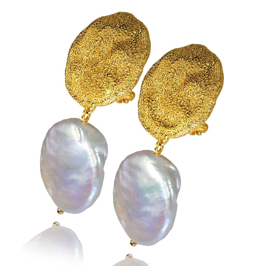 Alex Soldier Drop Dangle Clip-on Moneta Pearl Earrings are made in silver, infused (deeply plated) with 24 karat yellow gold and dark platinum (rhodium), with pearls and signature metalwork that creates an effect of inner sparkle. Handmade in NYC.