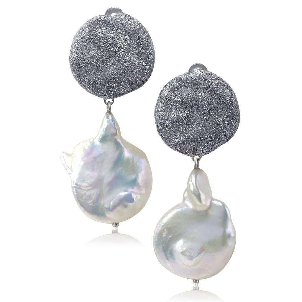 Alex Soldier Drop Dangle Coin Pearl Earrings: made in silver, infused (deeply plated) with platinum, with pearls and signature metalwork that creates an effect of inner sparkle. Handmade in NYC. Limited Edition. Please keep away from water, lotion