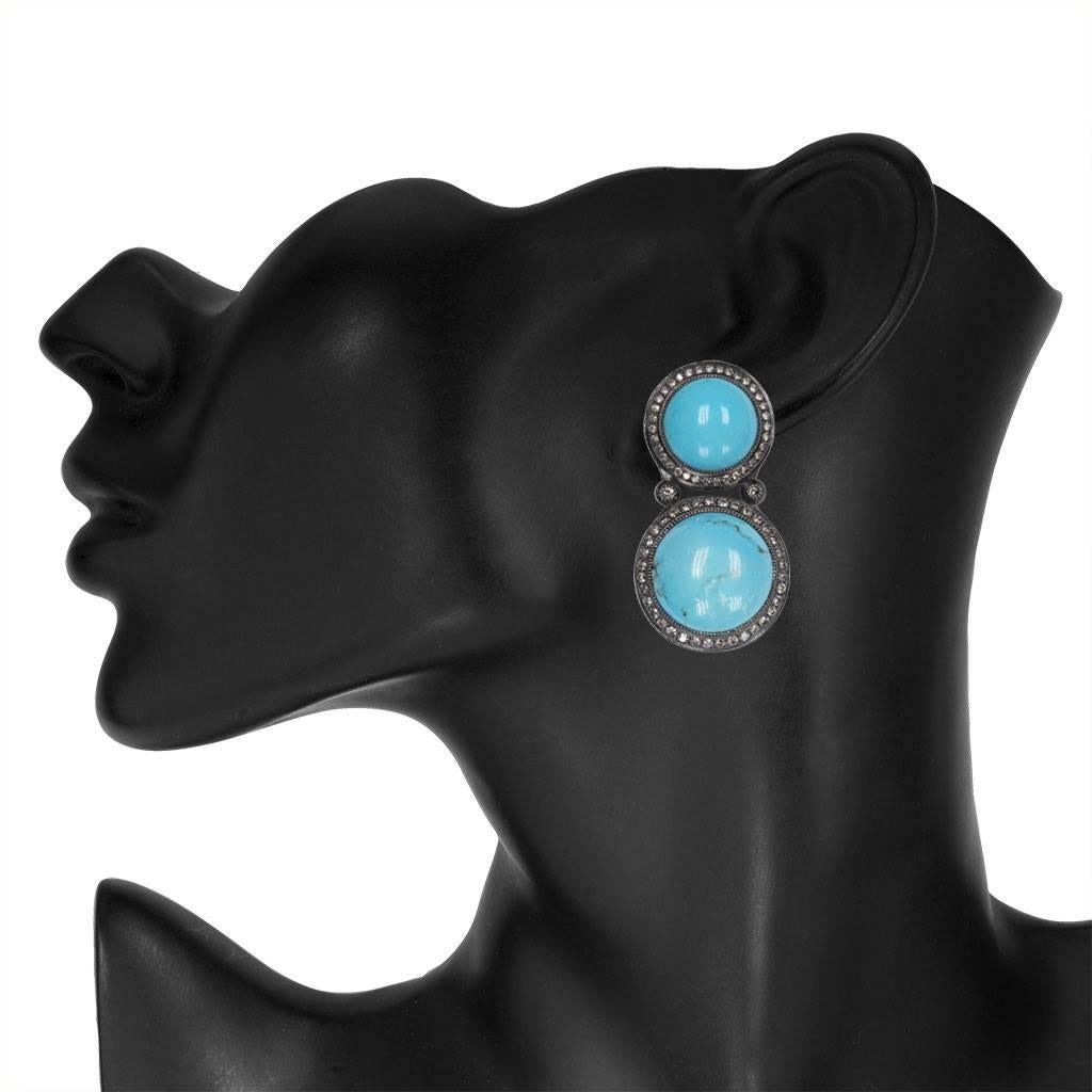 Alex Soldier Turquoise & Diamond Symbolica earrings are made in oxidized silver with diamonds surrounding the hand-cut turquoise center. Handmade in NYC. One of a kind. Top center stone diameter: 17.5 mm (each earring). Bottom center stone