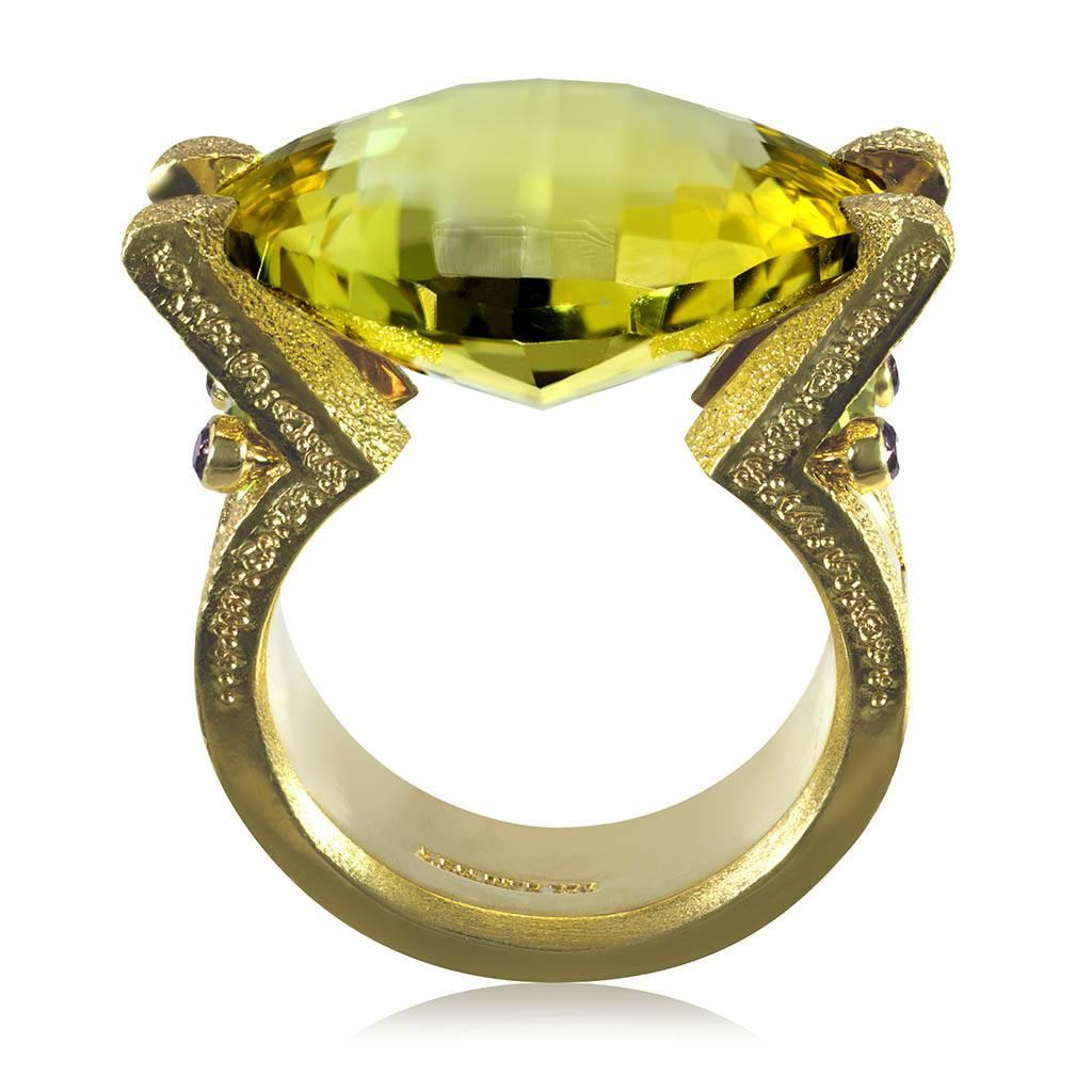 Equilibrium ring in 18 karat yellow gold with special cut tension set lemon quartz (25 ct), peridot (0.7 ct), and amethysts (0.15 ct). One of a kind. Handmade in NYC. Ring size: 6.5. Complimentary ring sizing is available within 2 business days.