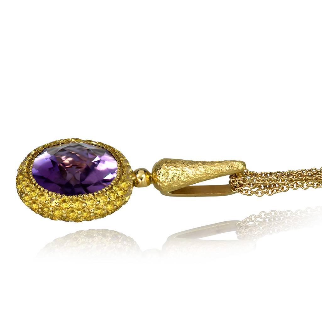 Alex Soldier's Cocktail Art Pendant: made in 18 karat yellow gold with 9 carats of amethyst and 2.2 carats of yellow sapphires. This gorgeous pendant features Alex Soldier's signature metalwork and includes 18 karat yellow gold multi-strand chain,
