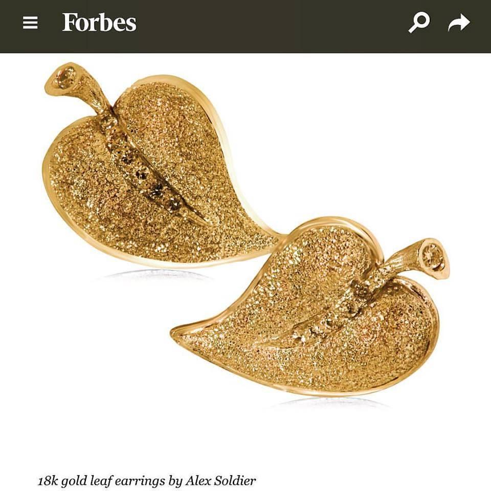 Alex Soldier Leaf earrings: made in 18 karat yellow gold with champagne diamonds (0.1 ct) and signature metalwork that creates an illusion of a diamond inlay. Handmade in NYC. Limited Edition.    

About The Artist: Known for his elaborate