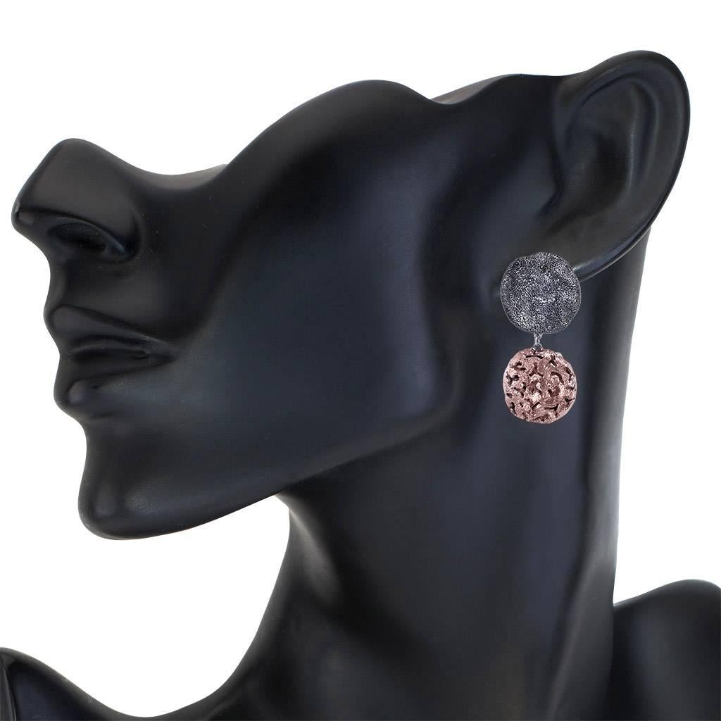 Alex Soldier Moneta Clip-on Earrings are made in silver with 18k rose gold and dark platinum (rhodium) infusion (deep plating) and signature metalwork that creates an illusion of a diamond inlay. Special open work technique makes these stunning