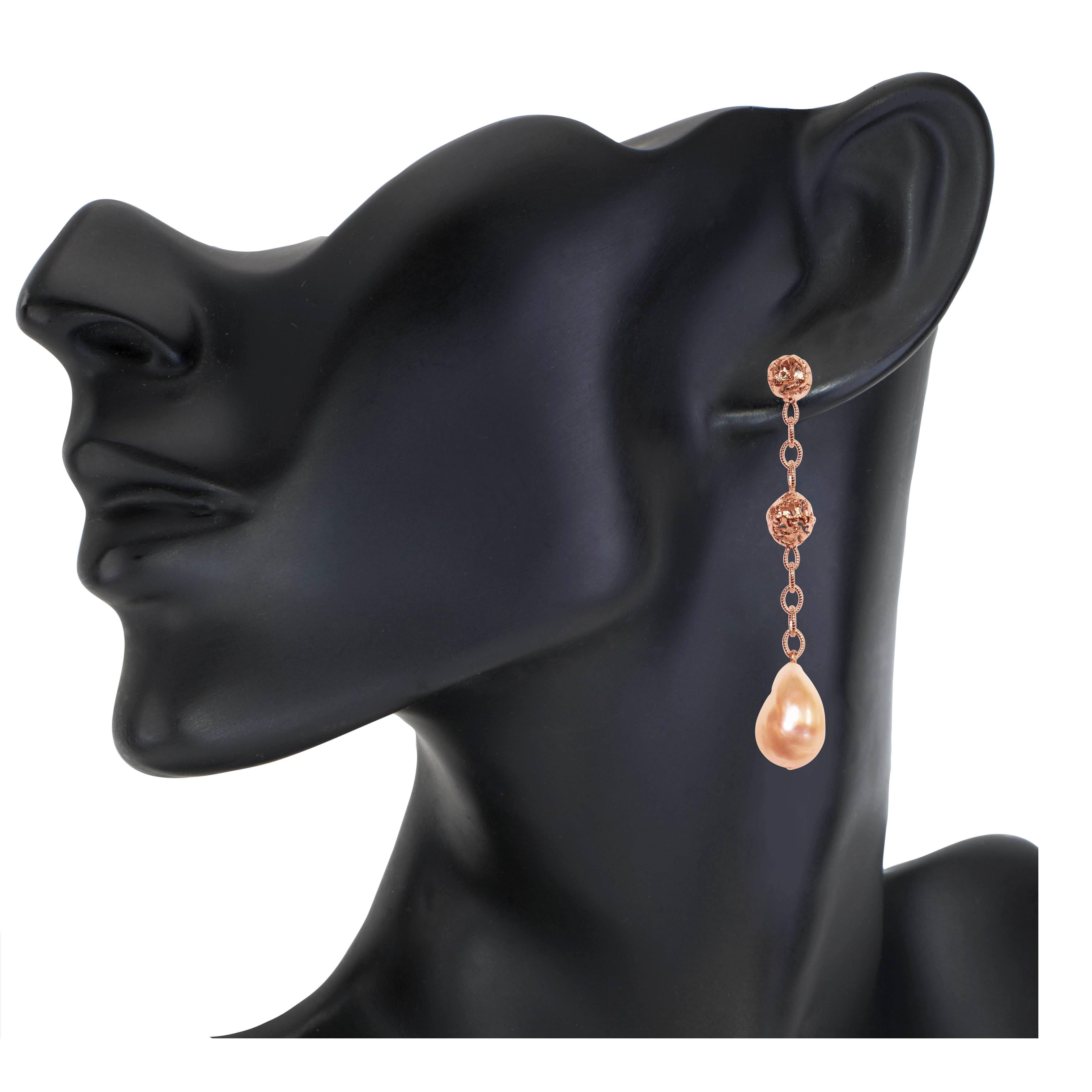 Alex Soldier Drop Dangle Pearl Earrings: made in sterling silver, infused (deep plating) with 18 karat rose gold with peach Freshwater pearls. Handmade in NYC. One of a kind. Please keep away from water, lotion and perfume to preserve color. 

About